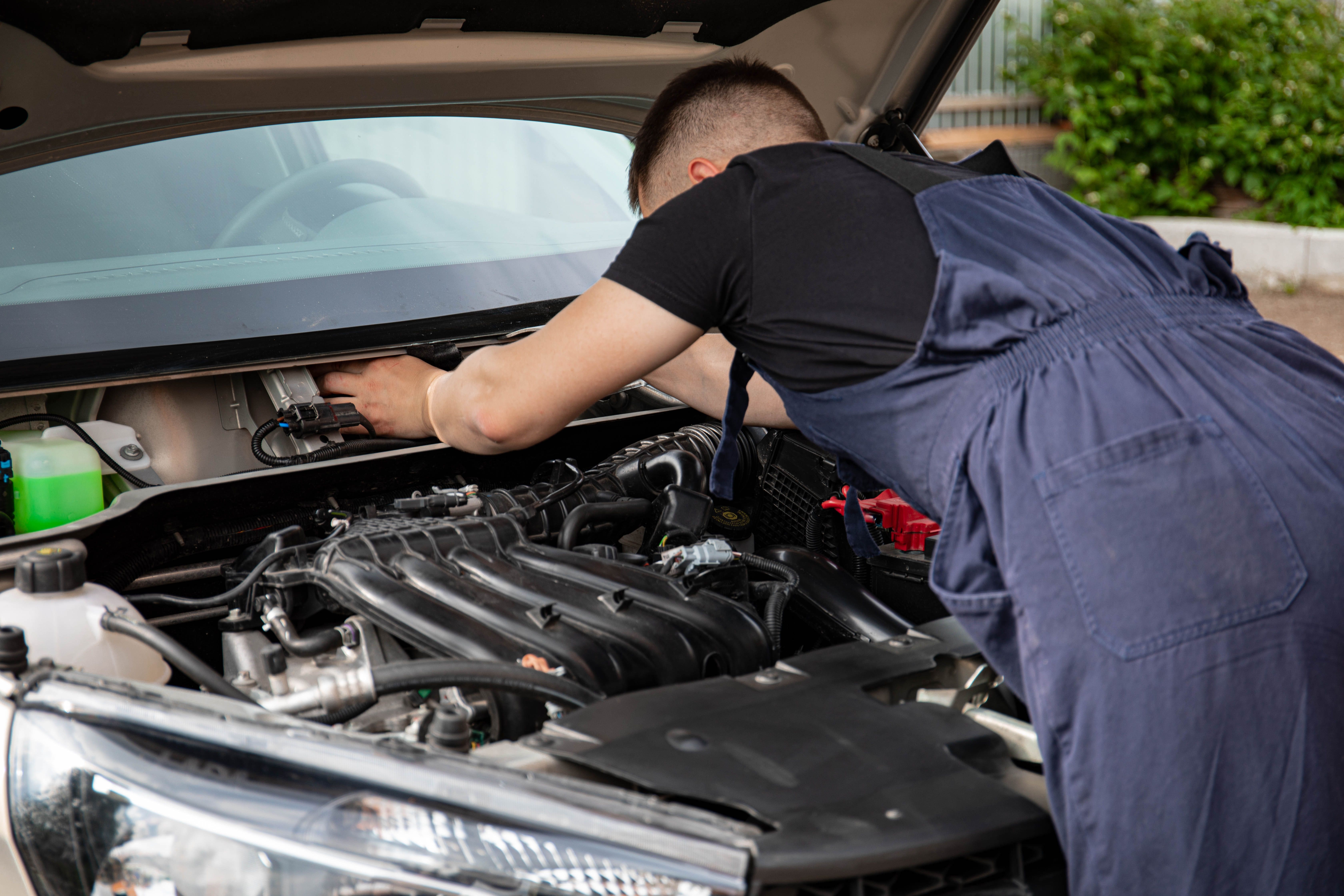 Mechanic working on a car